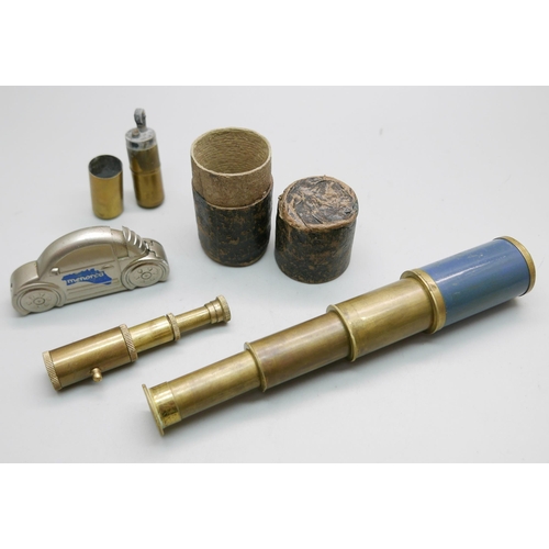 916 - A brass trench art type lighter, a pocket telescope, with case, and one other small telescope and a ... 