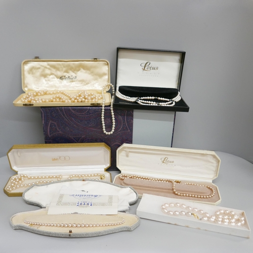 919 - Boxed pearls including Lotus and silver mounted