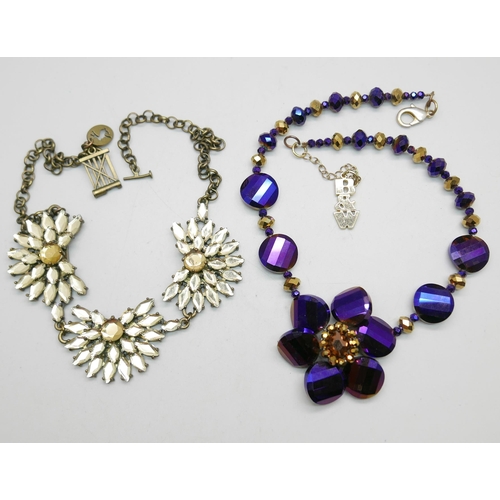 926 - A Butler and Wilson Purple and Gold necklace and a Joules rhinestone three flower necklace