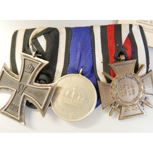 939 - A set of three WWI German medals and a collection of related ephemera, some later WWII period docume... 