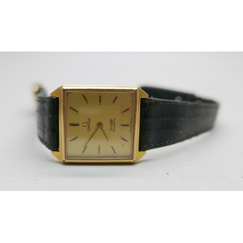 961 - A lady's Omega wristwatch wtih a midi Omega DeVille quartz wristwatch