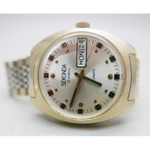 969 - A Sekonda automatic day/date wristwatch and a referee stop watch