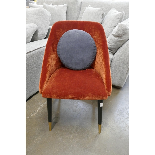 1302 - A rust velvet side chair