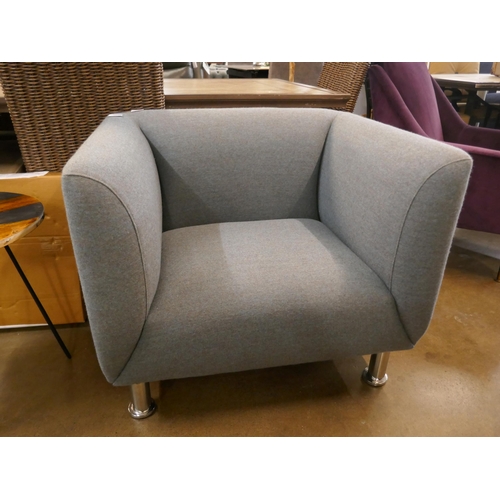 1307 - A grey upholstered armchair