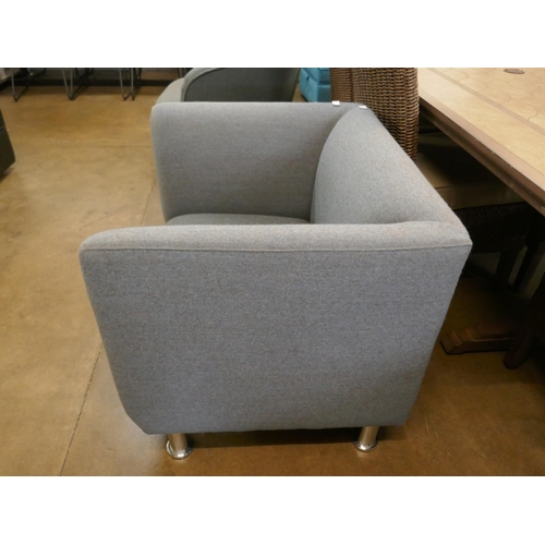 1307 - A grey upholstered armchair