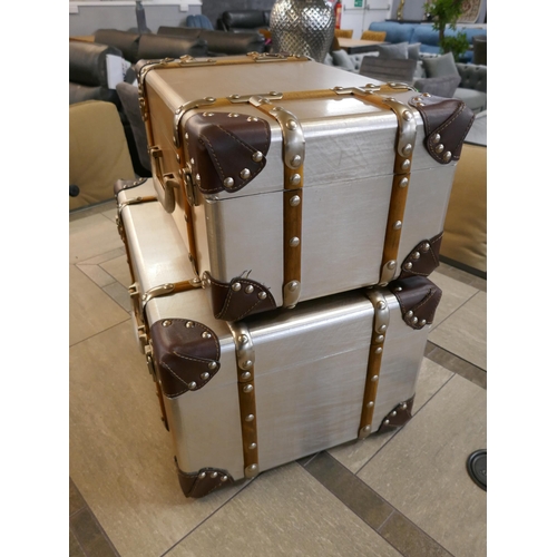 1310 - A pair of industrial style aluminium stacking trunks