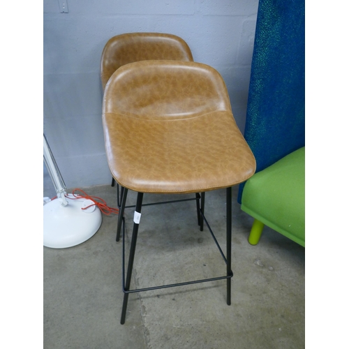 1313 - A pair of tan Helsinki bar stools, RRP £140