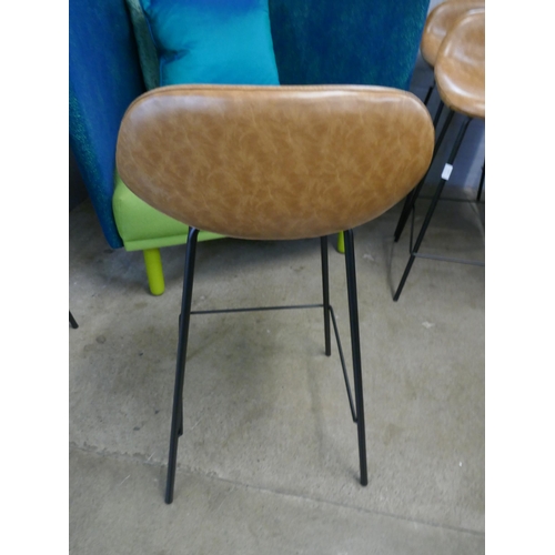 1313 - A pair of tan Helsinki bar stools, RRP £140