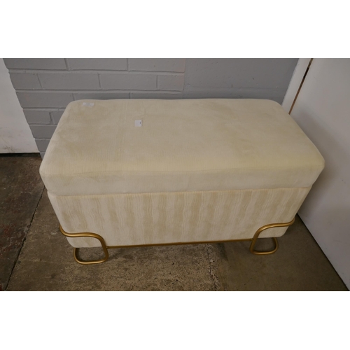 1388 - A cream upholstered storage stool