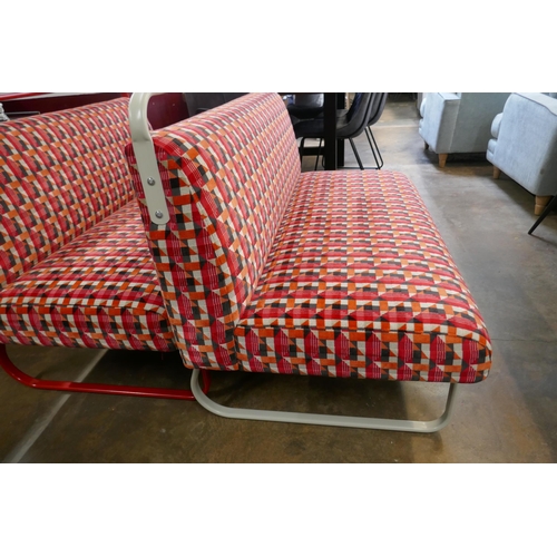 1400 - A metal framed bus style two seater sofa