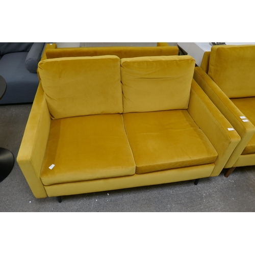 1448 - A turmeric velvet two seater sofa