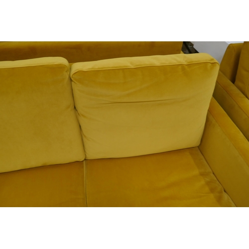 1448 - A turmeric velvet two seater sofa