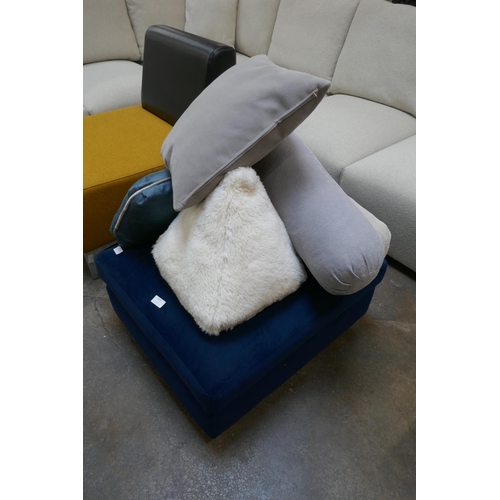 1472 - A blue velvet footstool and an assortment of scatter cushions