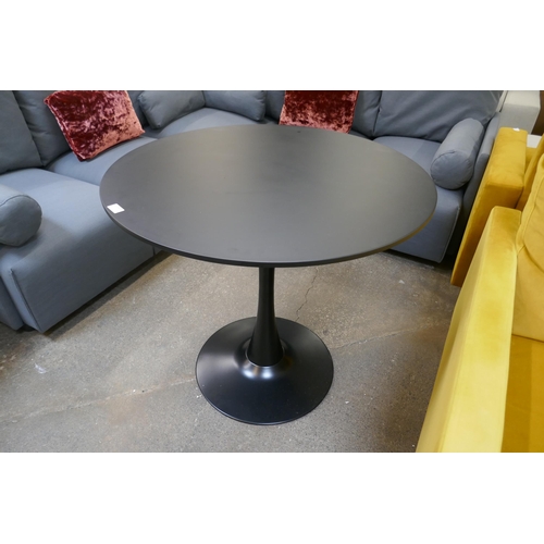 1474 - A Charles and Ray Eames style cast iron based tulip table