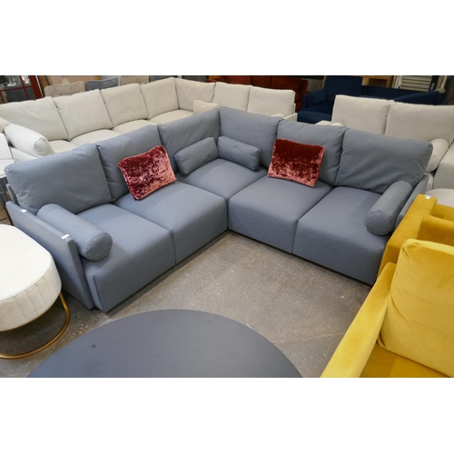 1476 - A steel blue upholstered five section corner sofa