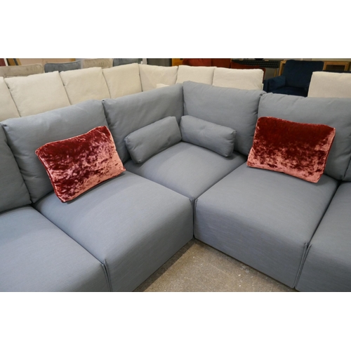 1476 - A steel blue upholstered five section corner sofa