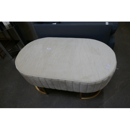 1477 - A cream upholstered stool wtih gold legs