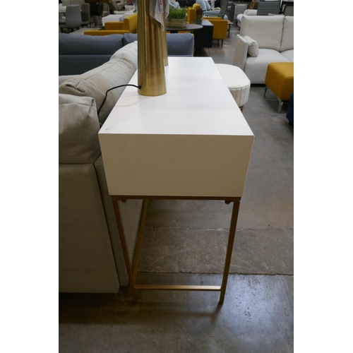 1478 - A white two drawer console table with gold legs