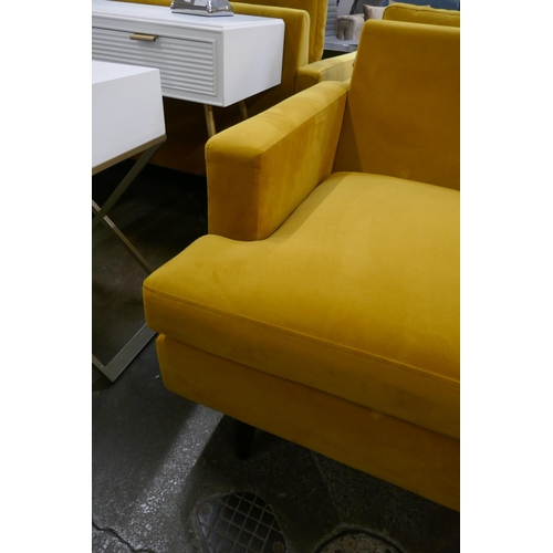 1483 - A turmeric velvet two seater sofa - missing back cushion