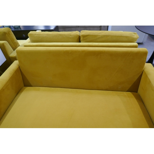 1483 - A turmeric velvet two seater sofa - missing back cushion