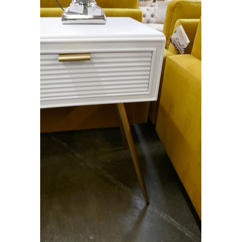 1485 - A white three drawer console table with gold legs