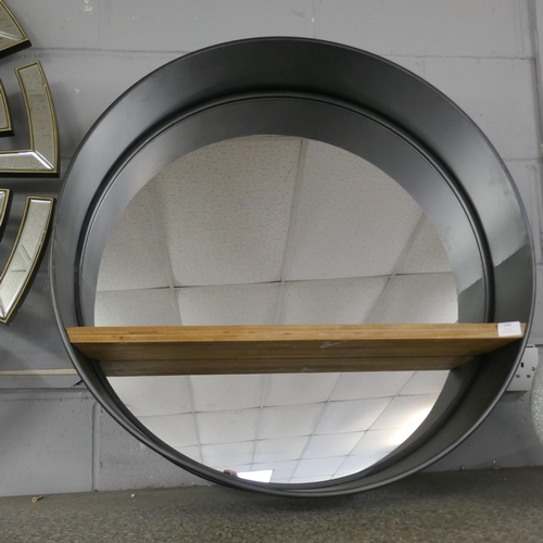 1492 - A circular mirror backed wall unit