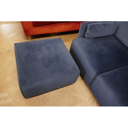 1500 - A blue velvet L shaped sofa and footstool