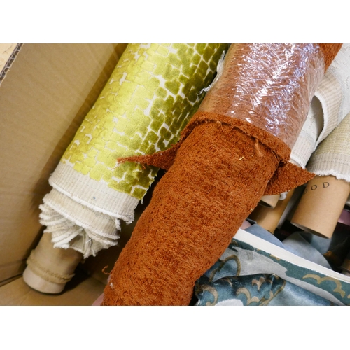 1581 - A box of upholstery fabric part rolls and roll ends