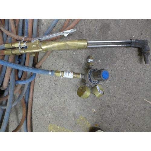 2367 - An oxy-acetylene welding torch and pipes