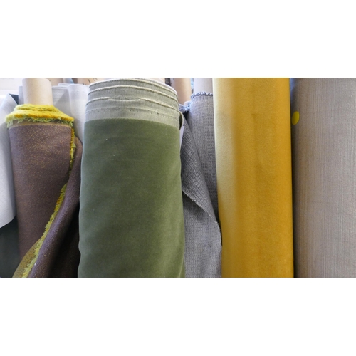 1590 - A large quantity of upholstery fabric part rolls and roll ends