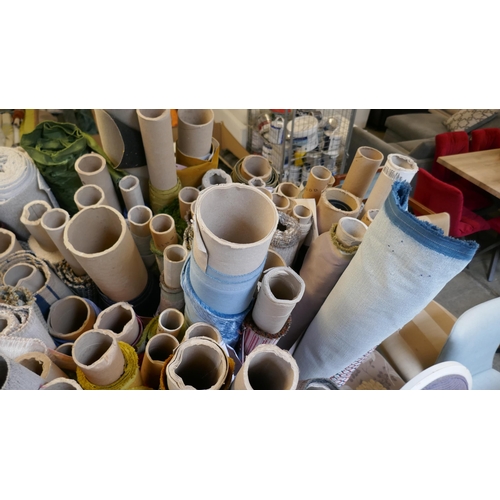 1590 - A large quantity of upholstery fabric part rolls and roll ends