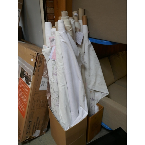 1592 - A large quantity of upholstery fabric part rolls and roll ends