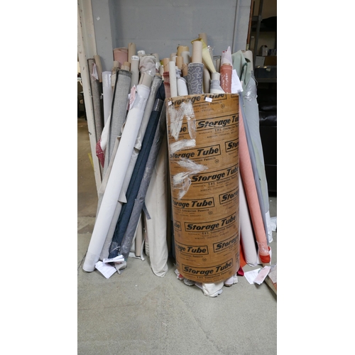 1599 - A large quantity of upholstery fabric part rolls and roll ends