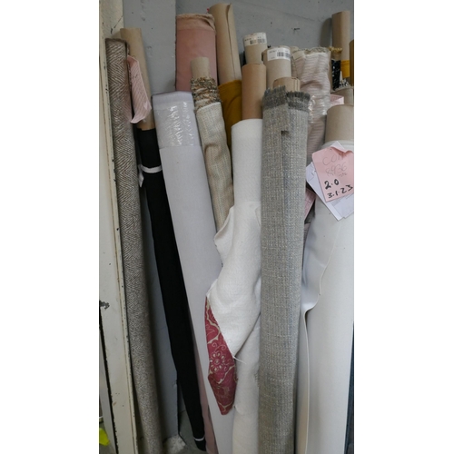 1599 - A large quantity of upholstery fabric part rolls and roll ends