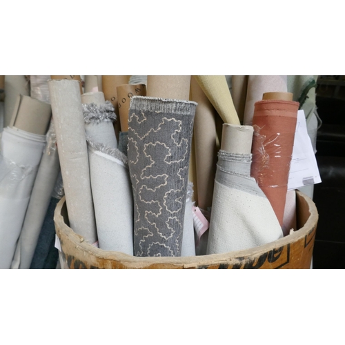 1599 - A large quantity of upholstery fabric part rolls and roll ends