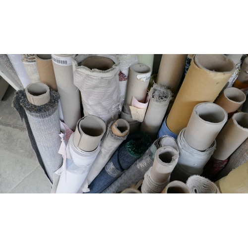 1599 - A large quantity of upholstery fabric part rolls and roll ends