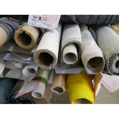 1613 - A pallet of upholstery fabric part rolls and roll ends