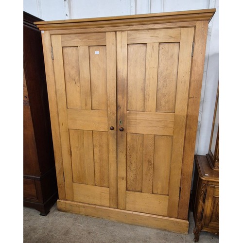 105 - A Victorian pine two door housekeepers cupboard