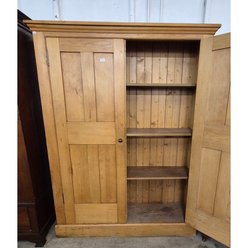 105 - A Victorian pine two door housekeepers cupboard