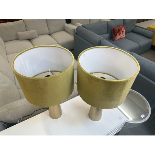 1479 - A pair of brass lamps with olive velvet shades