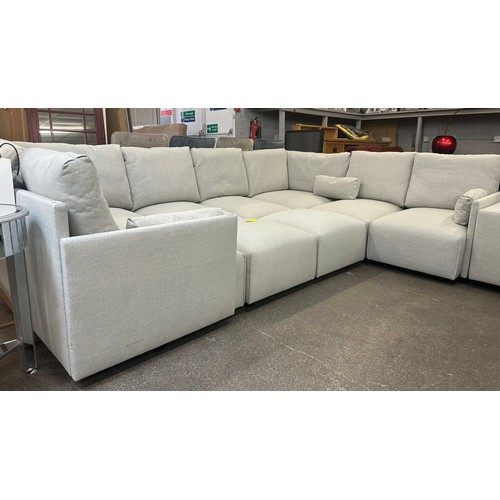 1481 - A grey linen eight section corner sofa