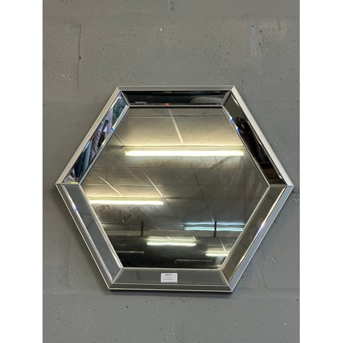 1671 - A Hexagonal wall mirror