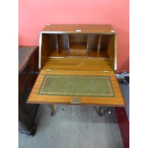 119 - A Queen Anne style burr walnut bureau de dame