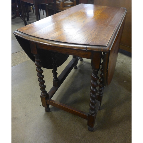 157 - Three oak oak barleytwist gateleg tables