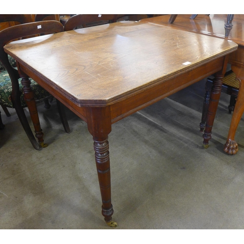 166 - A Victorian oak kitchen table