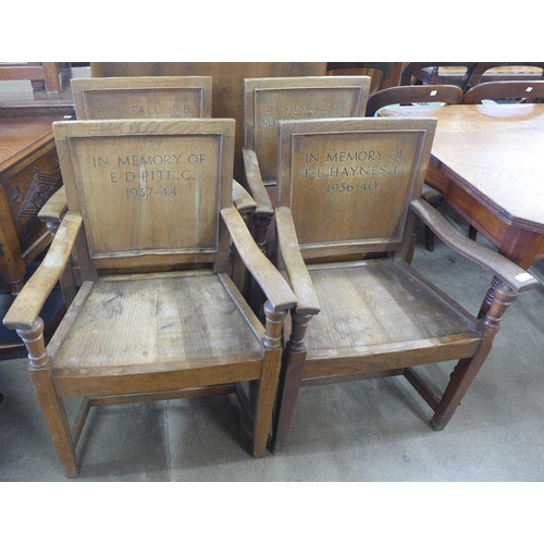 167 - A set of four oak elbow chairs