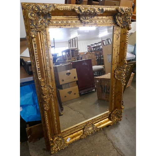 341 - A Victorian style gilt framed mirror