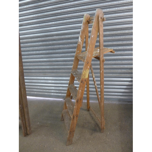 2185 - 3 Wooden ladders; double 12 rung, double 14 rung and 5 rung stepladder