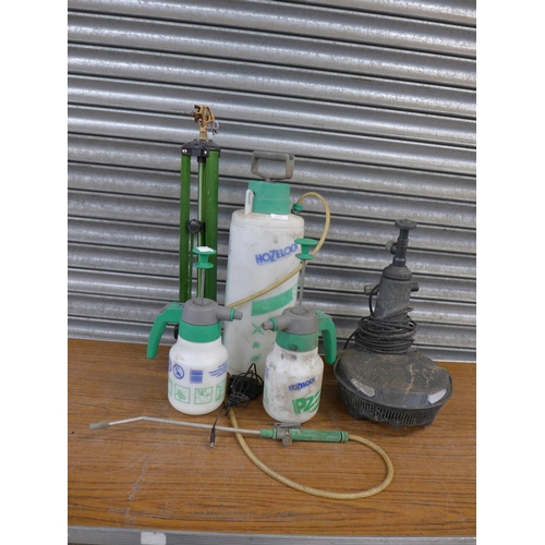 2246 - Two Hozelock P2 Polyspray spray bottles, a Hozelock 8l Killaspray spray bottle, a 240v pond pump and... 