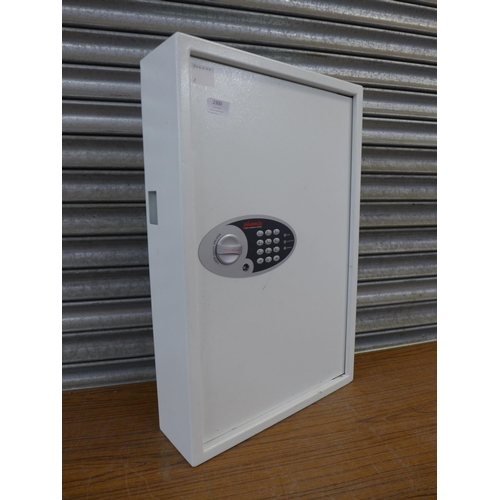 2300 - A Phoenix Safe Company Limited 66cm x 43cm x 13cm metal key safe with instruction booklet, spare key... 